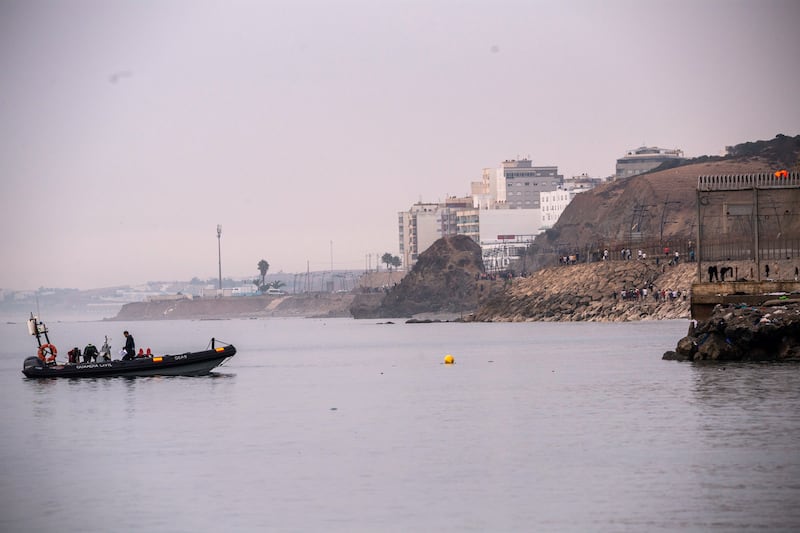 Migrants return to Morocco from the Spanish enclave of Ceuta. Photograph: Antonio Sempere/AP