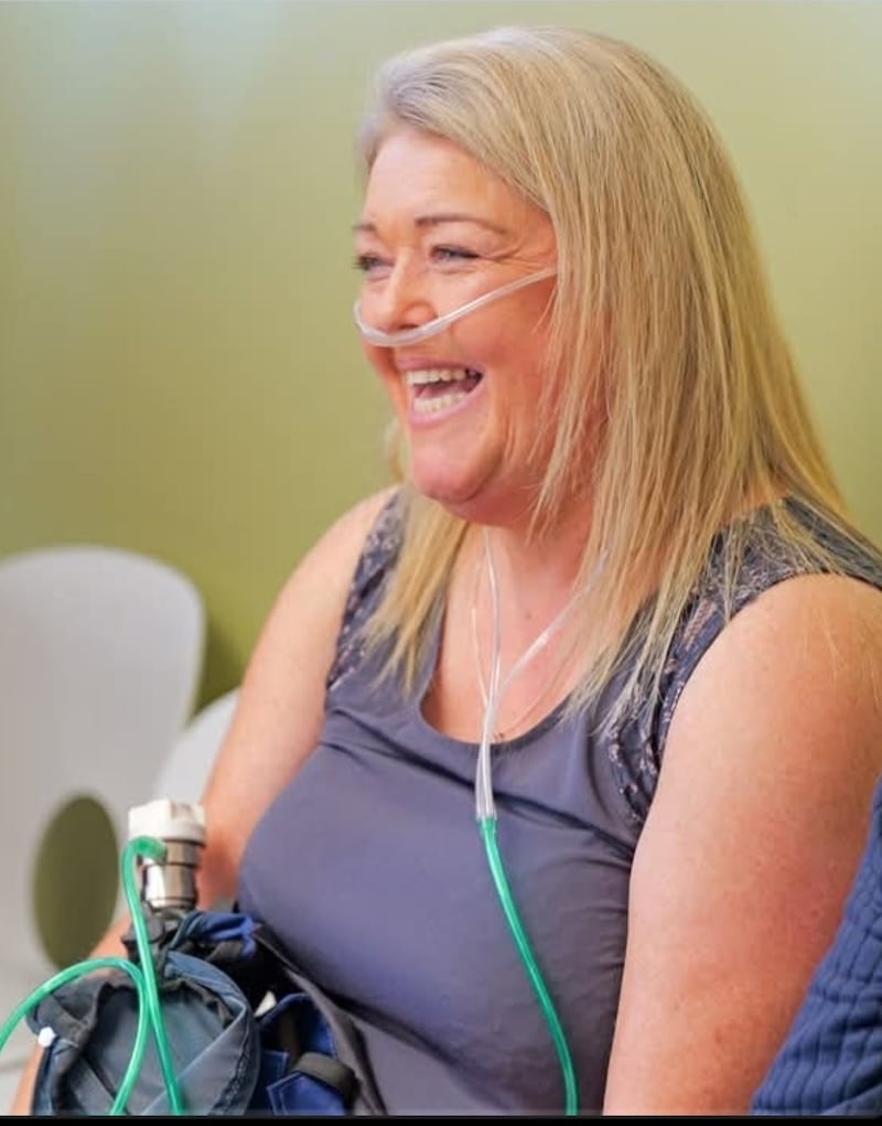 Primary school teacher Mary McGrath still needs her oxygen tanks while in class.