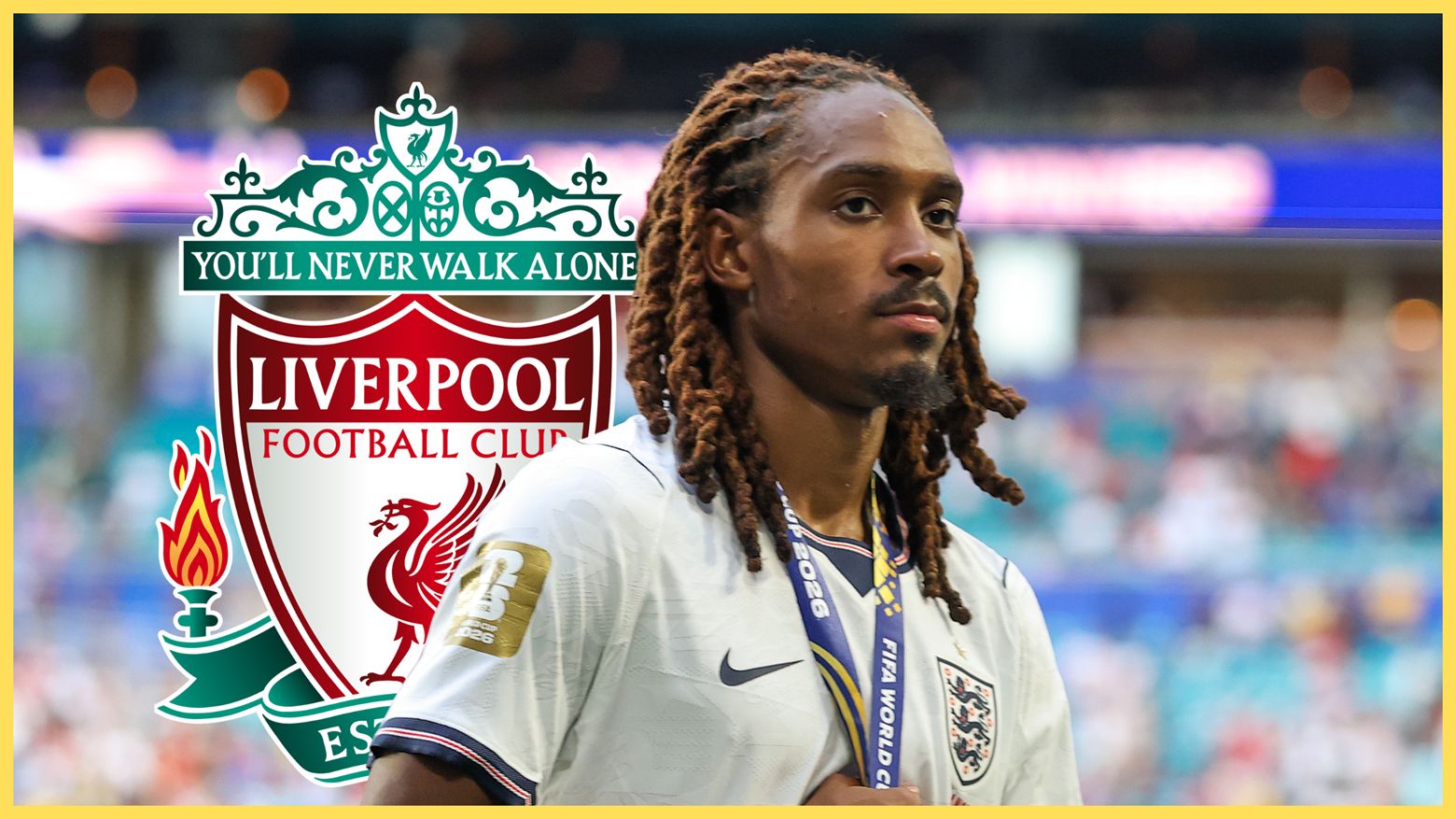 Tottenham fullback Djed Spence holds his third placed World Cup medal in front of Liverpool club crest.