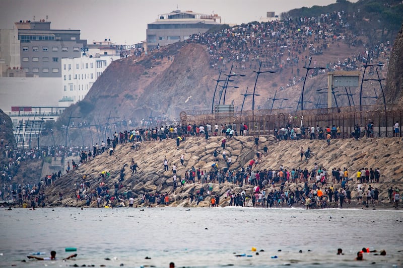 Migrants return to Morocco from the Spanish enclave of Ceuta on Friday. Photograph: Antonio Sempere/AP