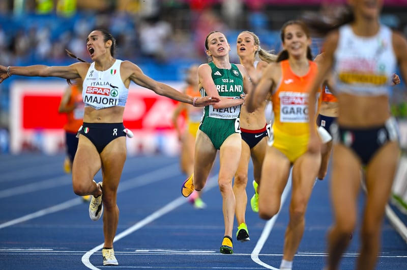 Sarah Healy (centre) after finishing fourth in the 5,000m. Photograph: Sam Barnes/Sportsfile via Getty Images