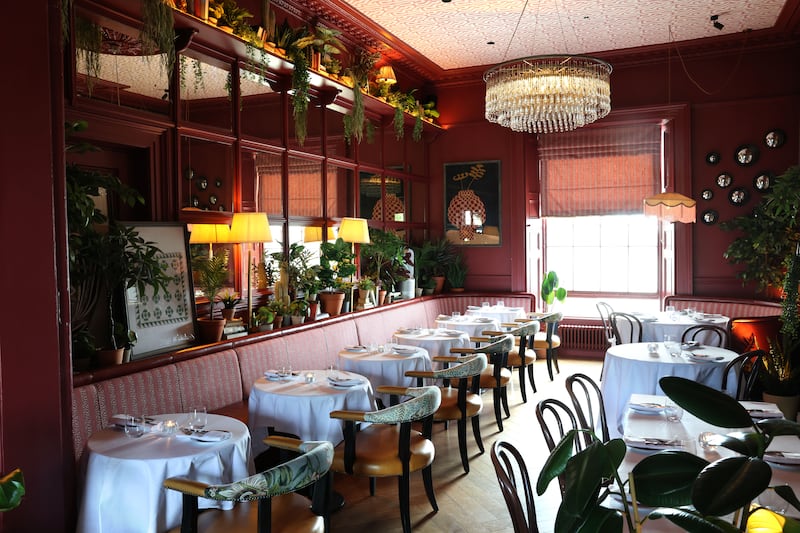 The interior of Osteria Nove, with linen-clad tables. Photograph: Dara Mac Dónaill