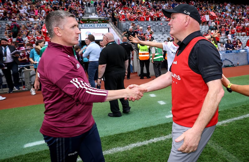 Galway manager Cathal Murray and Cork manager Ger Manley after the match. Photograph: Ben Brady/Inpho