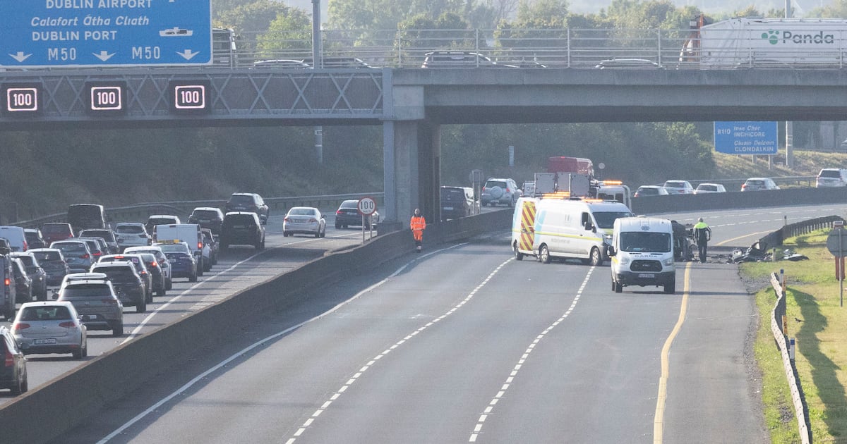 Car drives off M50 bridge, causing closure and major traffic disruption – The Irish Times