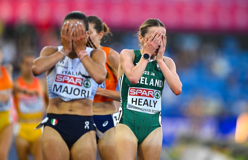 Sarah Healy after crossing the line. Photograph: Sam Barnes/Sportsfile via Getty Images