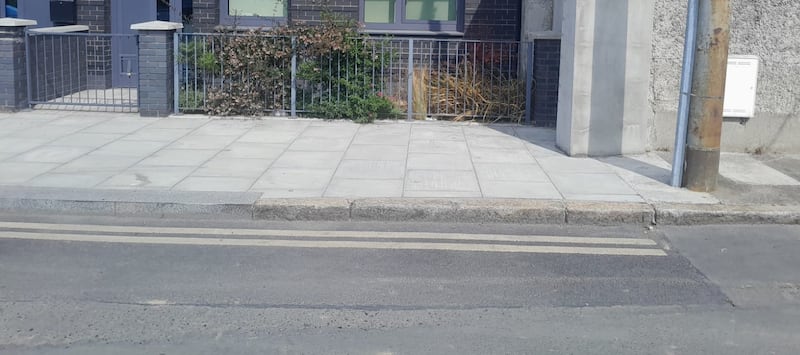 Granite kerb stones in Sweeney's Terrace across from Noel Clarke's home