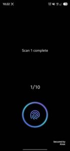 One UI 9.5 fingerprint enrollment screen with a large fingerprint icon inside a blue and purple glowing ring and a 1/10 scan counter