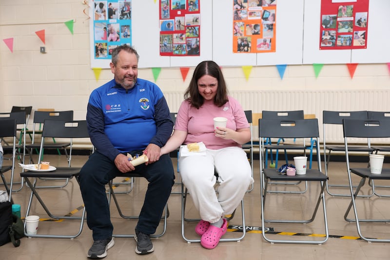 Maia O'Brien (18), holds her Leaving Certificate with her Dad, Sean O'Brien. For the first time ever, students with special educational needs that undertook the L1 and L2 learning programme modules received their results on the same day as other Leaving Certificate students at St. Catherine's Special School in Newcastle, County Wicklow. Photograph by Clodagh Kilcoyne/The Irish Times