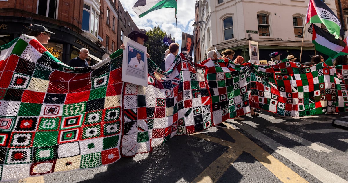Blanket with square for each child killed in Gaza brings silence to bustling Dublin street – The Irish Times