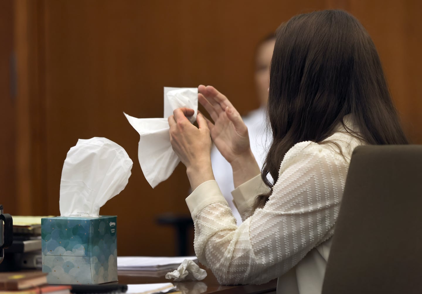 Lindsay Clancy grabs a tissue after witness Elaine Rossi, the nanny to the Clancy children, testified at Plymouth Superior Court in Plymouth on August 5, 2026.