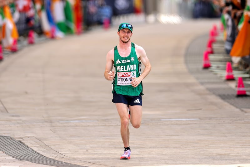 Paul O'Donnell on the finishing straight of the men's marathon at the European Athletics Championships. Photograph: Morgan Treacy/Inpho