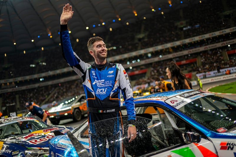 James Deane waves to the crowd at the 2024 Drift Masters European Championship event in Warsaw, Poland. Photograph: Joerg Mitter/Red Bull