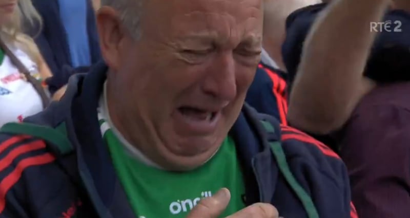 Mayo supporter Shane Fitzgerald weeps after his team won the final