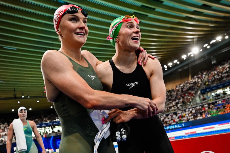 Ellen Walshe celebrates with Britain's Abbie Wood  (left) after the 200m IM final. Photograph: Giorgio Scala/Inpho