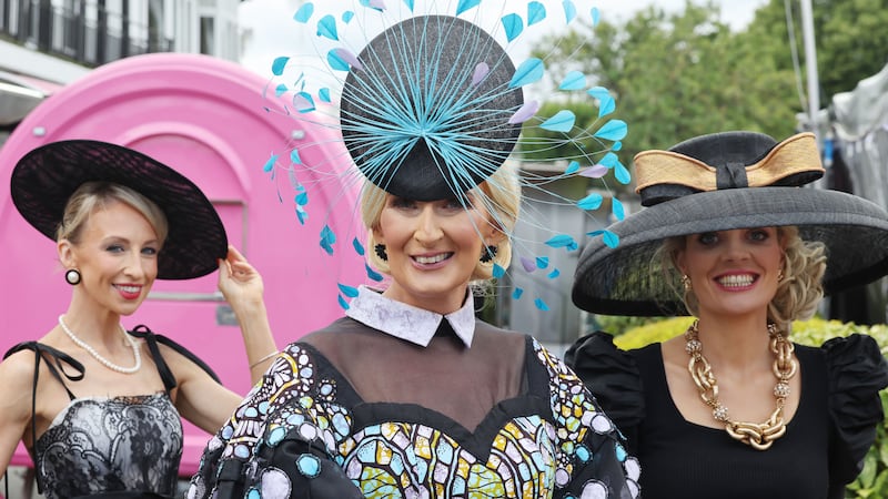Orla Fitzpatrick, from Dublin, Breda Butler, of Tipperary and Anne Marie Corbett from Cork, registered to compete in the Best Dressed Competition on Ladies Day. Photograph: Alan Betson/The Irish Times