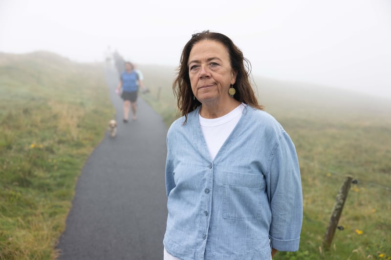Ellie Byrne at the Kilkee cliff walk on a misty day this week. Photograph: Eamon Ward