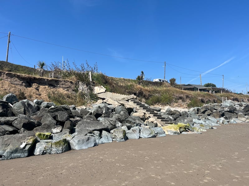 A buckled set of steps that Bill Kelly used to walk down to access the beach at Rosslare Strand just a year ago. Photograph: Steven Carroll