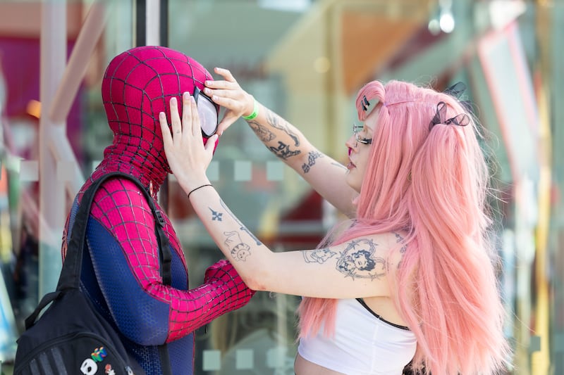 Charlie Bibby from Wexford dressed as Spiderman and Vin from Cardiff dressed as Nicole from Zenless Zone Zero at Dublin Comic Con. Photograph: Tom Honan