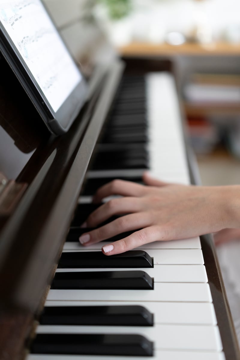 Freya Terris playing at her home in Lisburn. Photograph: Chris Maddaloni/The Irish Times






