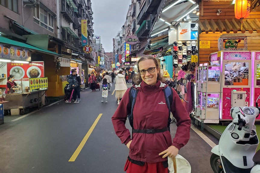 Mia Sandgren poses at a street market in Taipei.