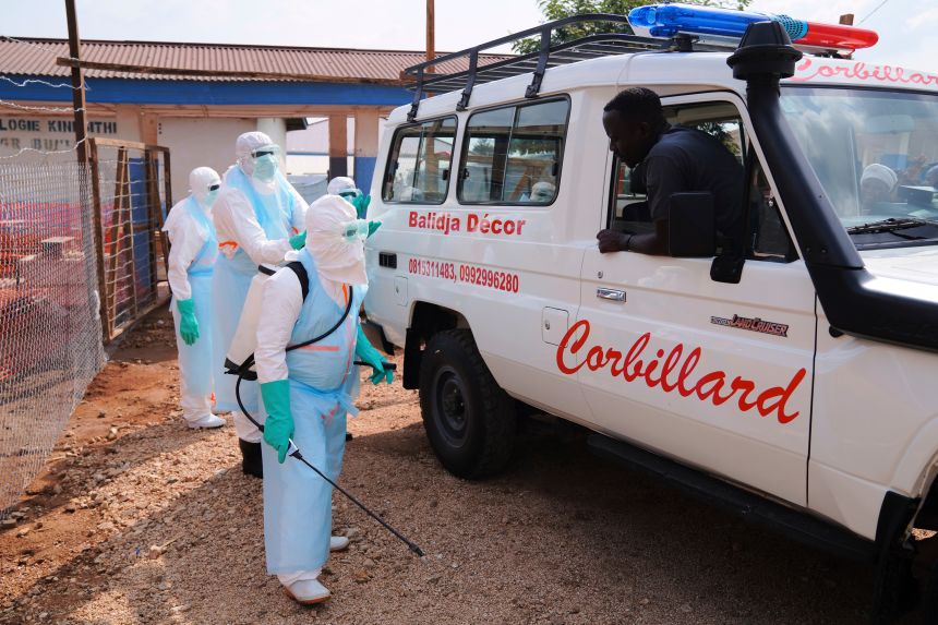 Health workers disinfect an ambulance at the Ebola Treatment Center at Bunia General Hospital in Ituri, on July 22, 2026.