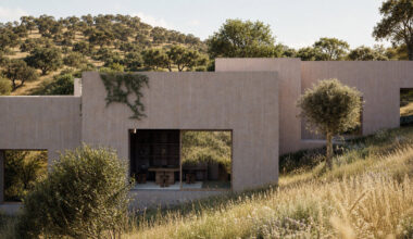 cluster of nine houses unfolds across portugal’s cork-oak landscape