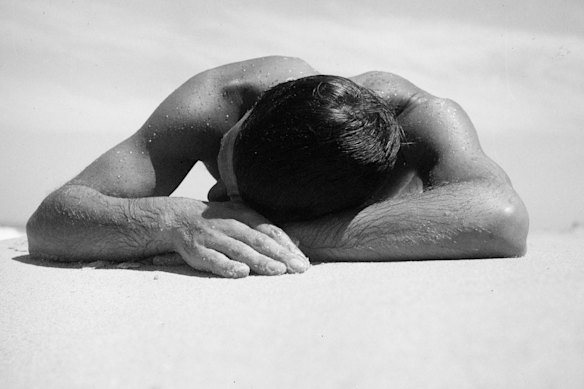 The Sunbaker, c. 1938. This version of Dupain’s most famous photograph was not his preferred shot of Harold ‘Hal’ Salvage sunbaking. 