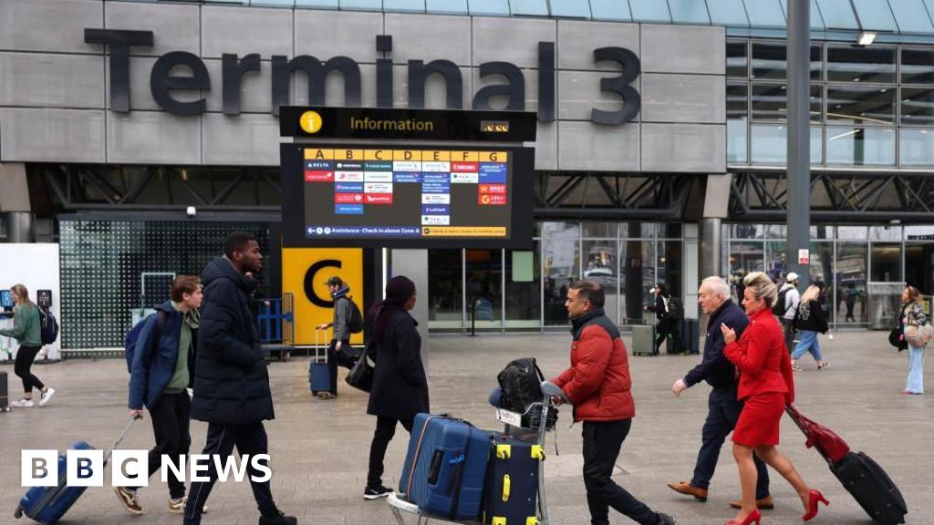 Heathrow Airport roads reopen after mains burst on ring road - BBC