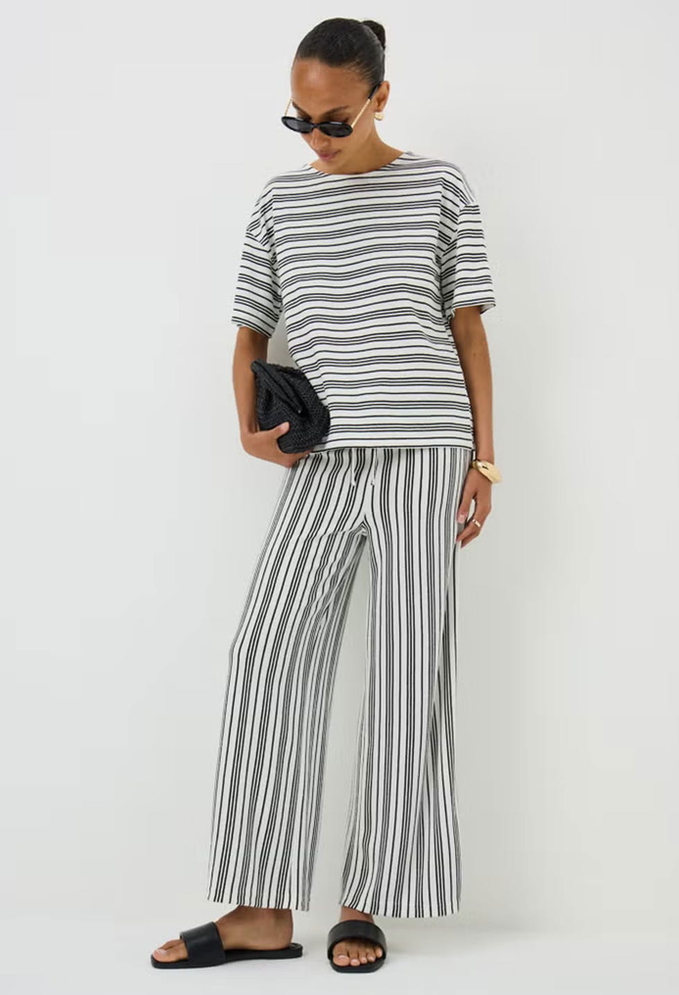 matalan striped knitted co-ord female model wearing a matalan striped knitted co ord