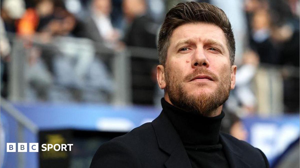 Head and shoulders view of a bearded Sebastien Pocognoli in black rollneck jumper and dark smart jacket