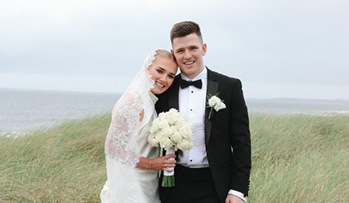 Pics: Sam makes the guest list as Mayo's Fergal Boland and wife Roberta bring All-Ireland cup to wedding