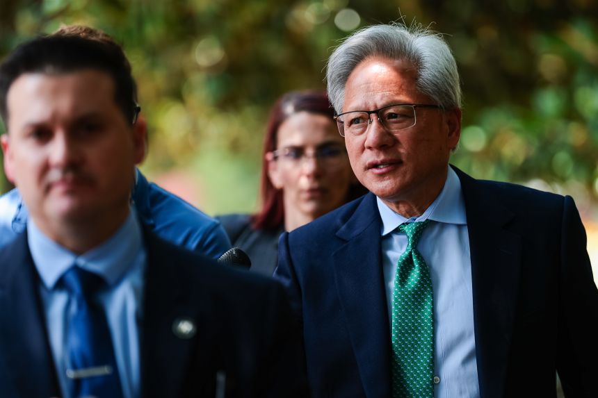 Nvidia CEO Jensen Huang after meeting with lawmakers to discuss American leadership on artificial intelligence on July 28. Huang is pushing for a coalition that promotes open source defense against rogue AI attacks.