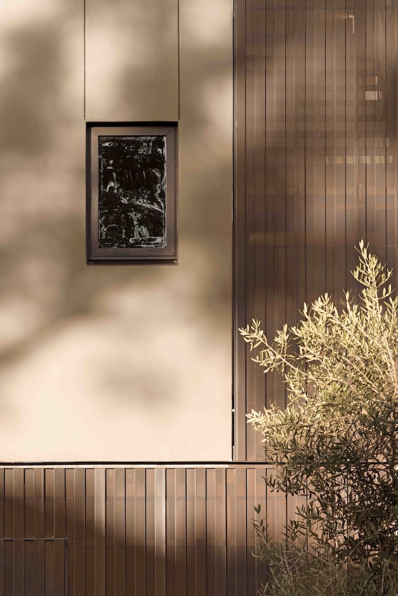 bronze corrugated metal wraps spf:architects' multifamily housing in west hollywood - 4