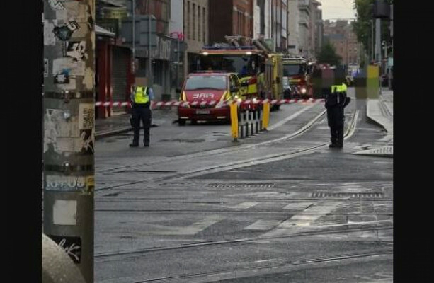Gardaí convince man who climbed crane in Dublin city centre to come down