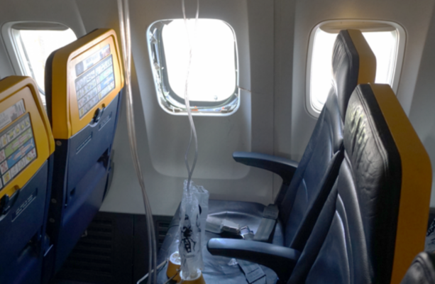 Broken engine part shattered Ryanair plane window that saw man nearly sucked out, probe finds