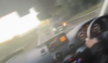 What's the official advice for drivers if you meet a car speeding the wrong way towards you?