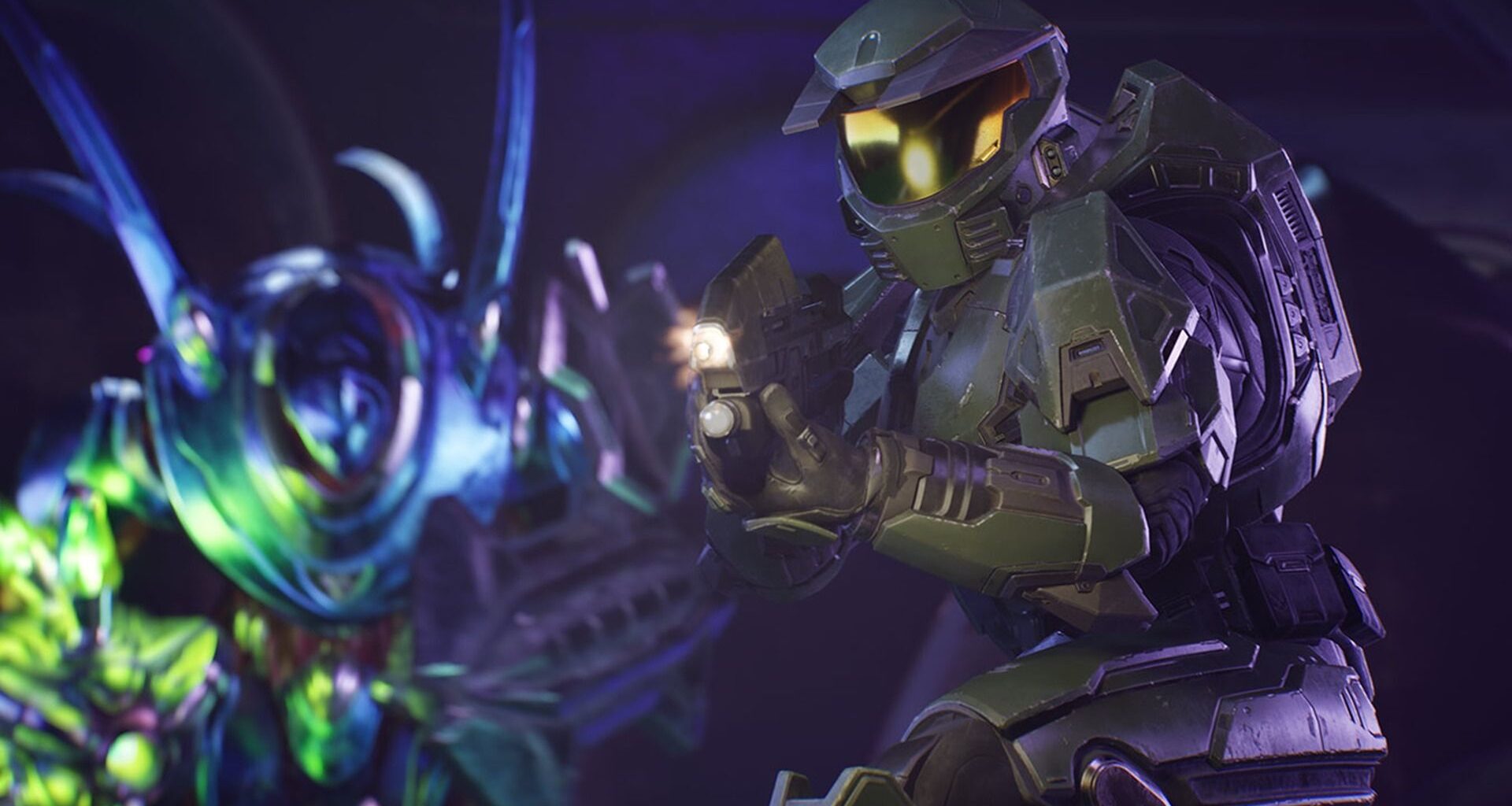 Master Chief in green armor holds a pistol with a flashlight in a dark environment, facing a glowing blue and green alien creature in the background.