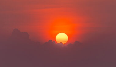 Dramatic sunset sky view with clouds and sunbeam. Hoi An - Vietnam.