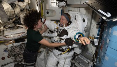 Expedition 74 flight engineers Sophie Adenot of ESA (European Space Agency) and Jessica Meir of NASA work together inside the International Space Station’s Quest airlock. Adenot is wearing a spacesuit in a powered and pressurized configuration to test its mobility, comfort, and optimal fit. Meir also assisted Adenot in conducting suit leak and pressure checks while verifying the suit’s communications hardware and life‑support systems.