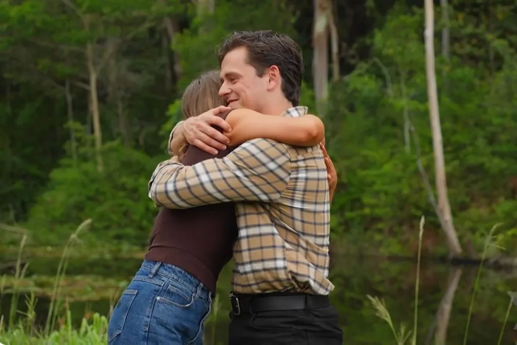 Farmer Alex hugs Rachel