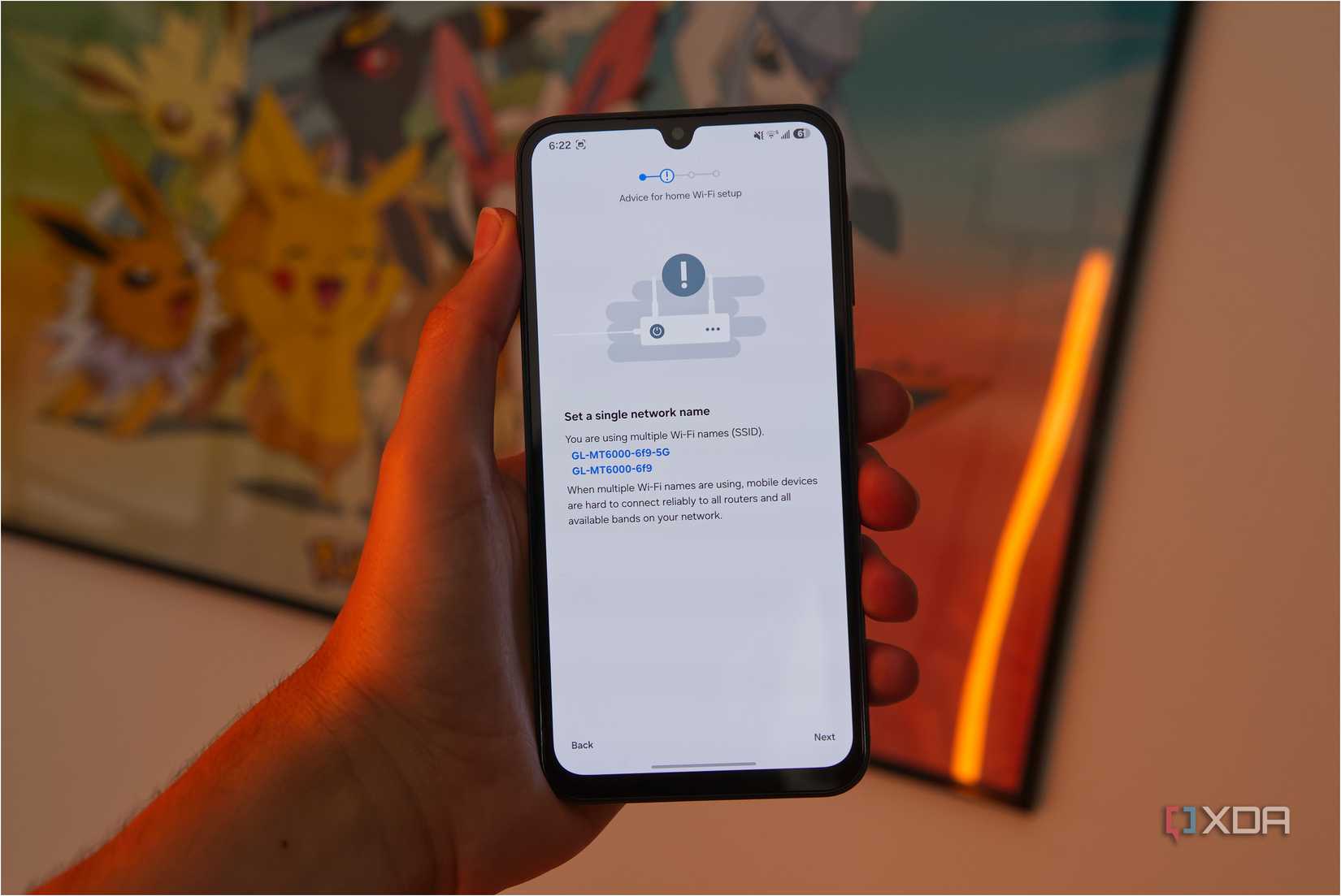 A Samsung smartphone showing a screen suggesting that a network using two Wi-Fi names is configured to use only one