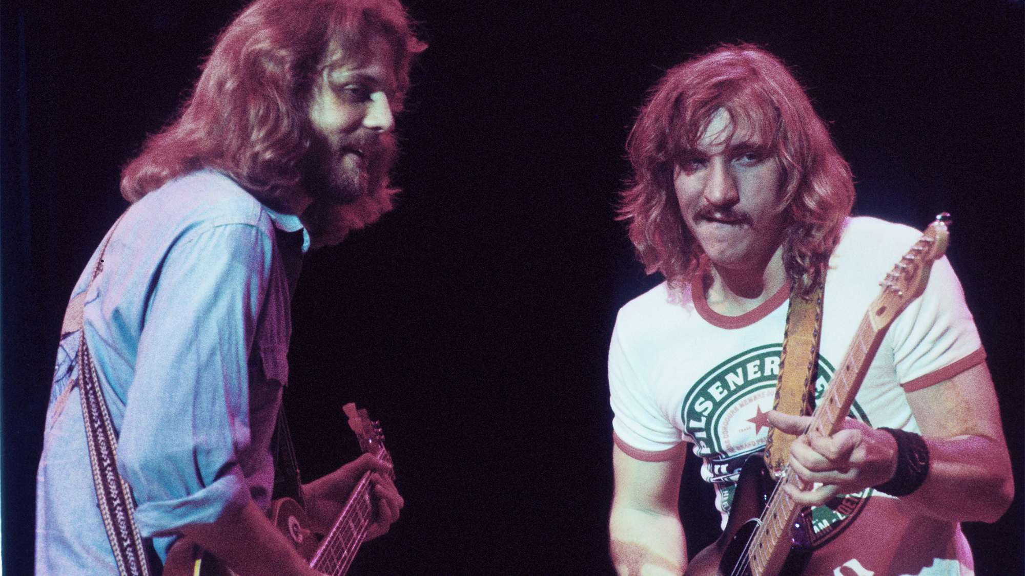 (L-R) Don Felder and Joe Walsh of The Eagles perform on stage at Ahoy on 11th May 1977 in Rotterdam, Netherlands.