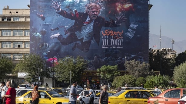 A view of a new billboard featuring President Donald Trump alongside a slogan reading, 'Great Victory, Strait of Hormuz'