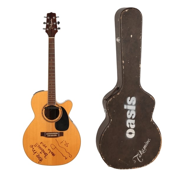 Noel Gallagher's autographed Takamine FP460SC acoustic guitar