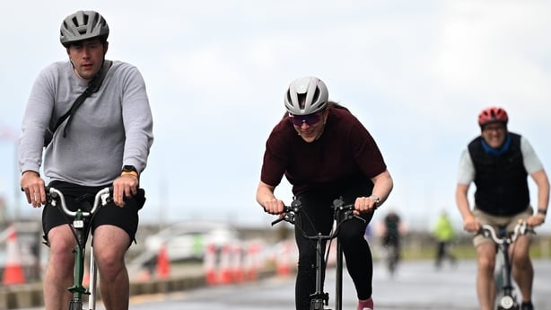 Olympic medallist in sailing, Annalise Murphy, centre, competing in the Brompton race during the National Criterium Championships in Dublin.