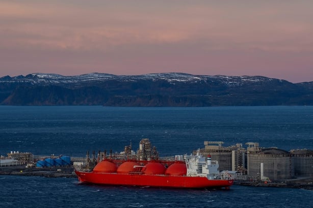 A LNG ship is pictured at the island Melkoya where Norwegian energy giant Equinor has built a facility for receiving and processing natural gas from the Snøhvit field in the Barents Sea on November 2, 2022 - - Norway OUT (Photo by Fredrik Varfjell / NTB / AFP) / Norway OUT (Photo by FREDRIK VARFJELL