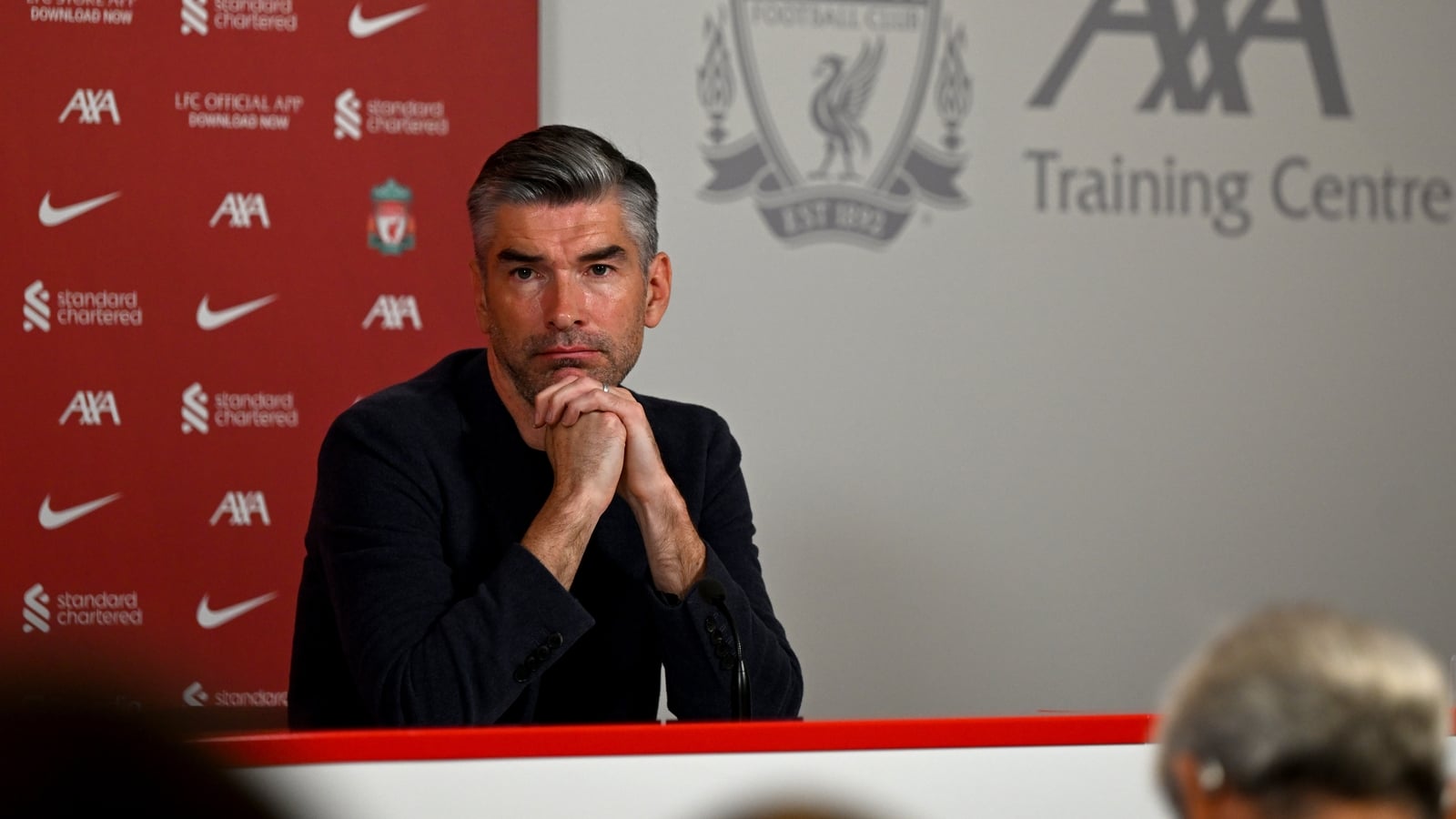 Liverpool sporting director Hughes leaves role