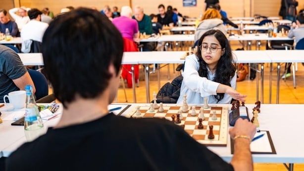 Trisha Kanyamarala playing chess against an opponent