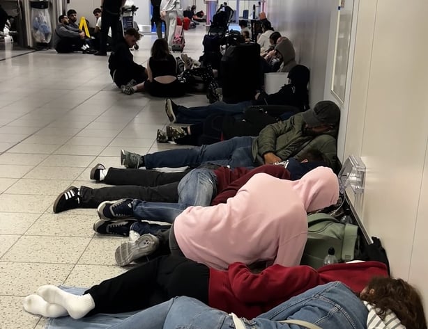 Those wishing to travel sleep on the floor at Gatwick Airport.