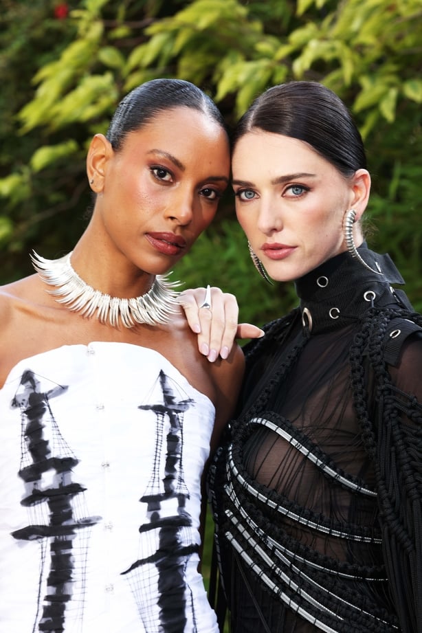 Thais wears 'Tall Ship' dress by Daniel Fahy and Beak Choker by Kate Murphy, and Ciara wears Skele Corset dress by Daniel Fahy, Sable earrings and Singlet Claw ring by Kate Murphy.